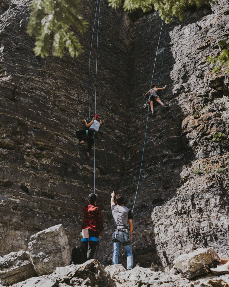 Photo by Martin Wyall via Unsplash rock climbing